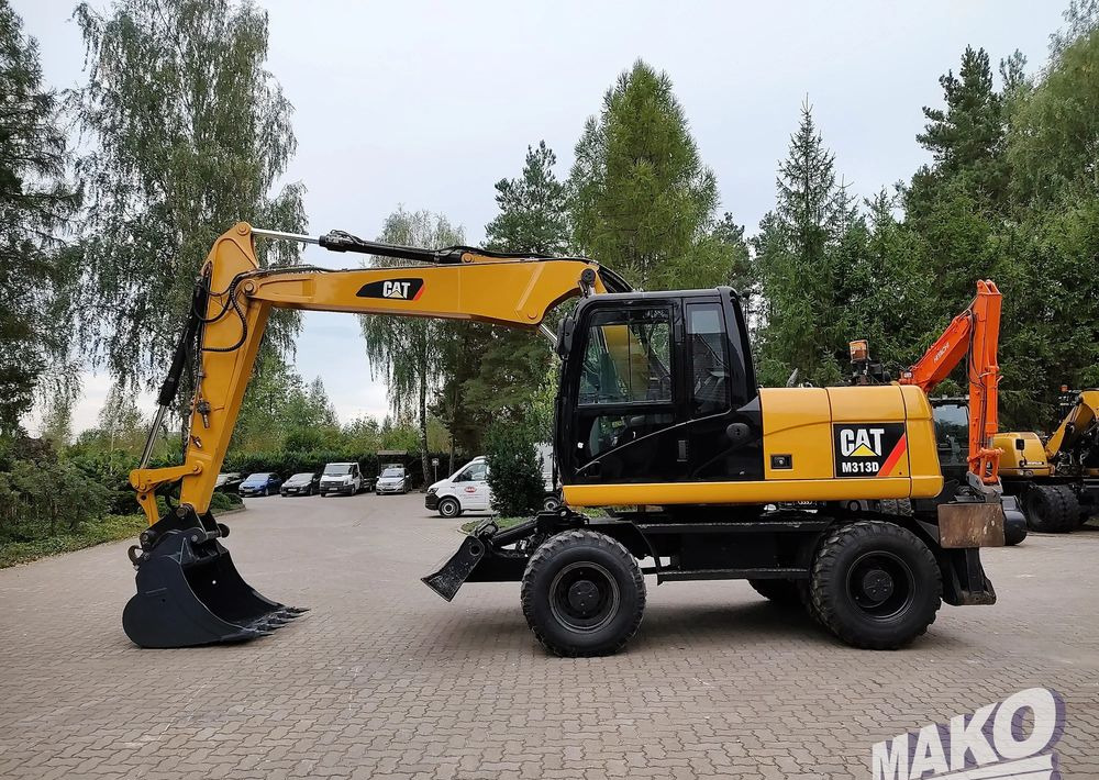 Caterpillar M313D - Escavatore gommato: foto 1 Caterpillar M313D - Escavatore gommato: foto 1