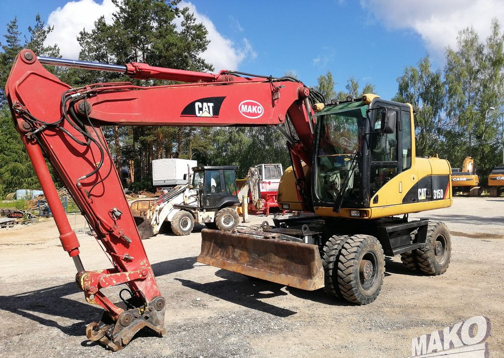 Caterpillar M315 C - Escavatore gommato: foto 1 Caterpillar M315 C - Escavatore gommato: foto 1