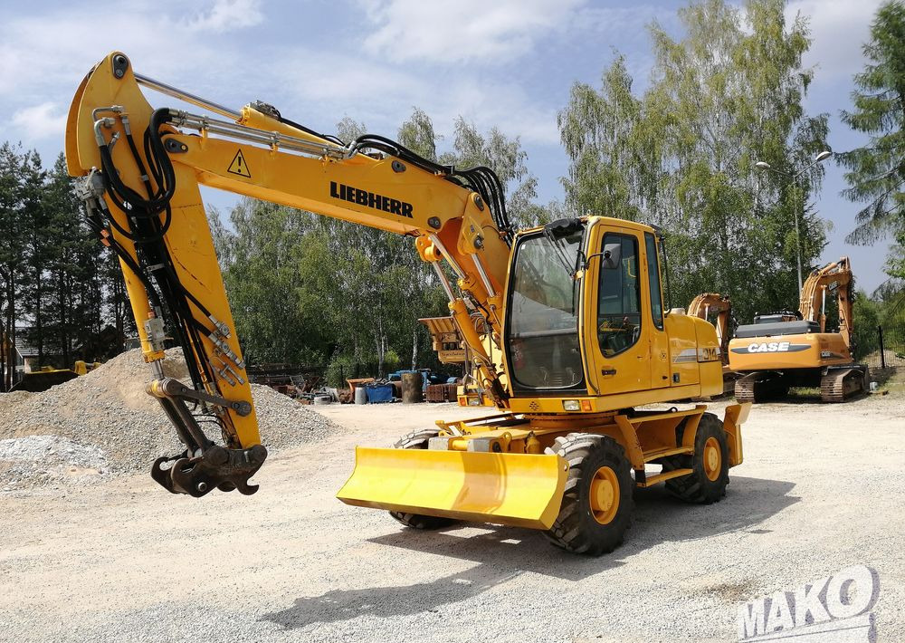Liebherr A 314 Litronic - Escavatore gommato: foto 1 Liebherr A 314 Litronic - Escavatore gommato: foto 1