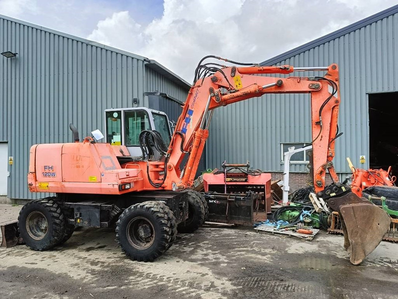 FIAT-HITACHI FH120W bandenkraan Wheel Excavator graafmachine - Escavatore gommato: foto 1 FIAT-HITACHI FH120W bandenkraan Wheel Excavator graafmachine - Escavatore gommato: foto 1