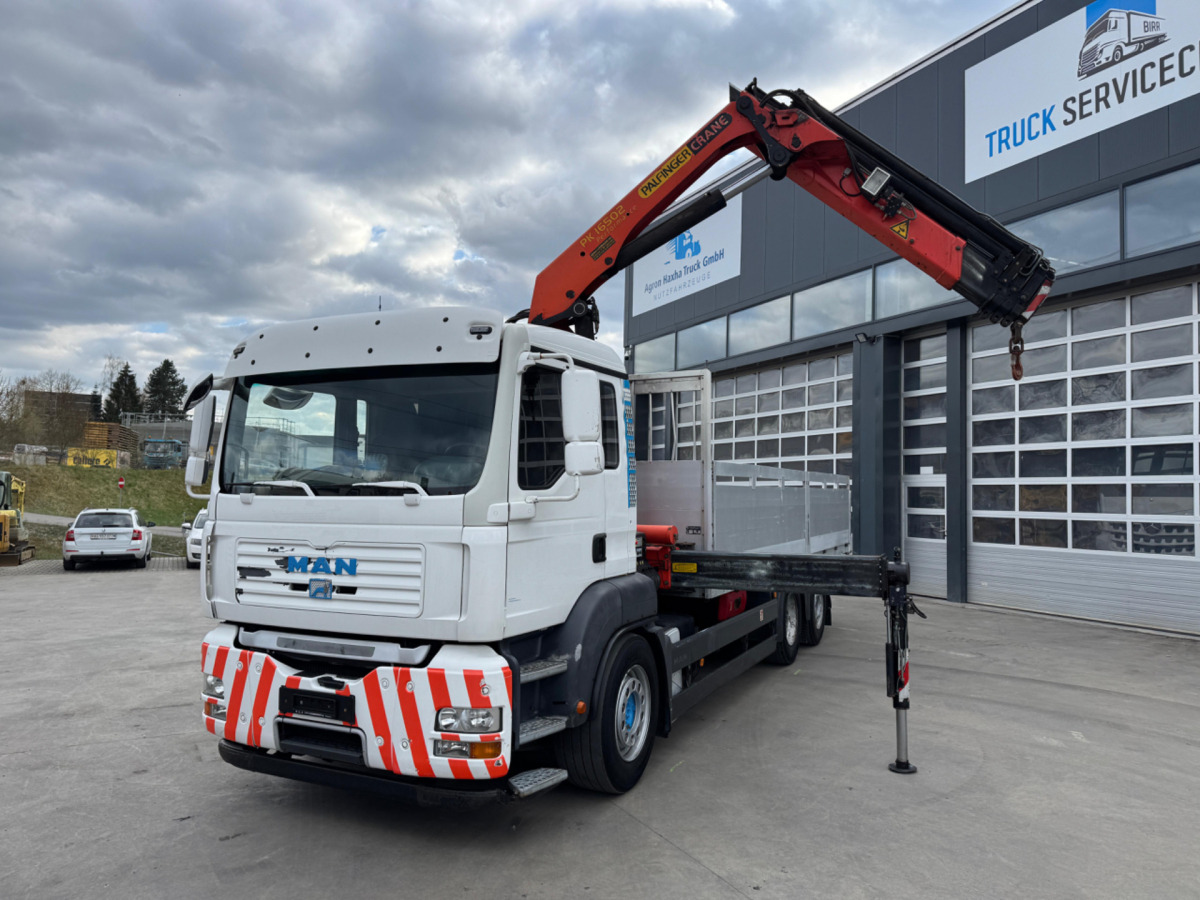 MAN TGA 26.440 6x2 PK16502-4 - Camion con gru: foto 1 MAN TGA 26.440 6x2 PK16502-4 - Camion con gru: foto 1