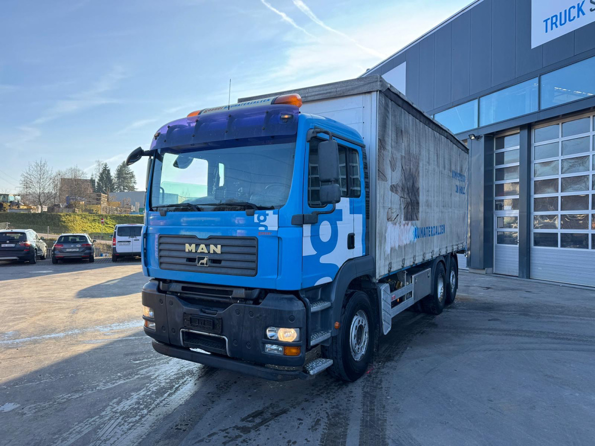 MAN TGA 26.440 6x2 - Camion centinato: foto 1 MAN TGA 26.440 6x2 - Camion centinato: foto 1