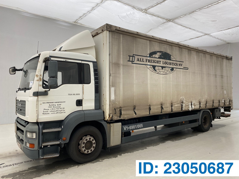 MAN TGA 18.320 - Camion centinato: foto 1 MAN TGA 18.320 - Camion centinato: foto 1