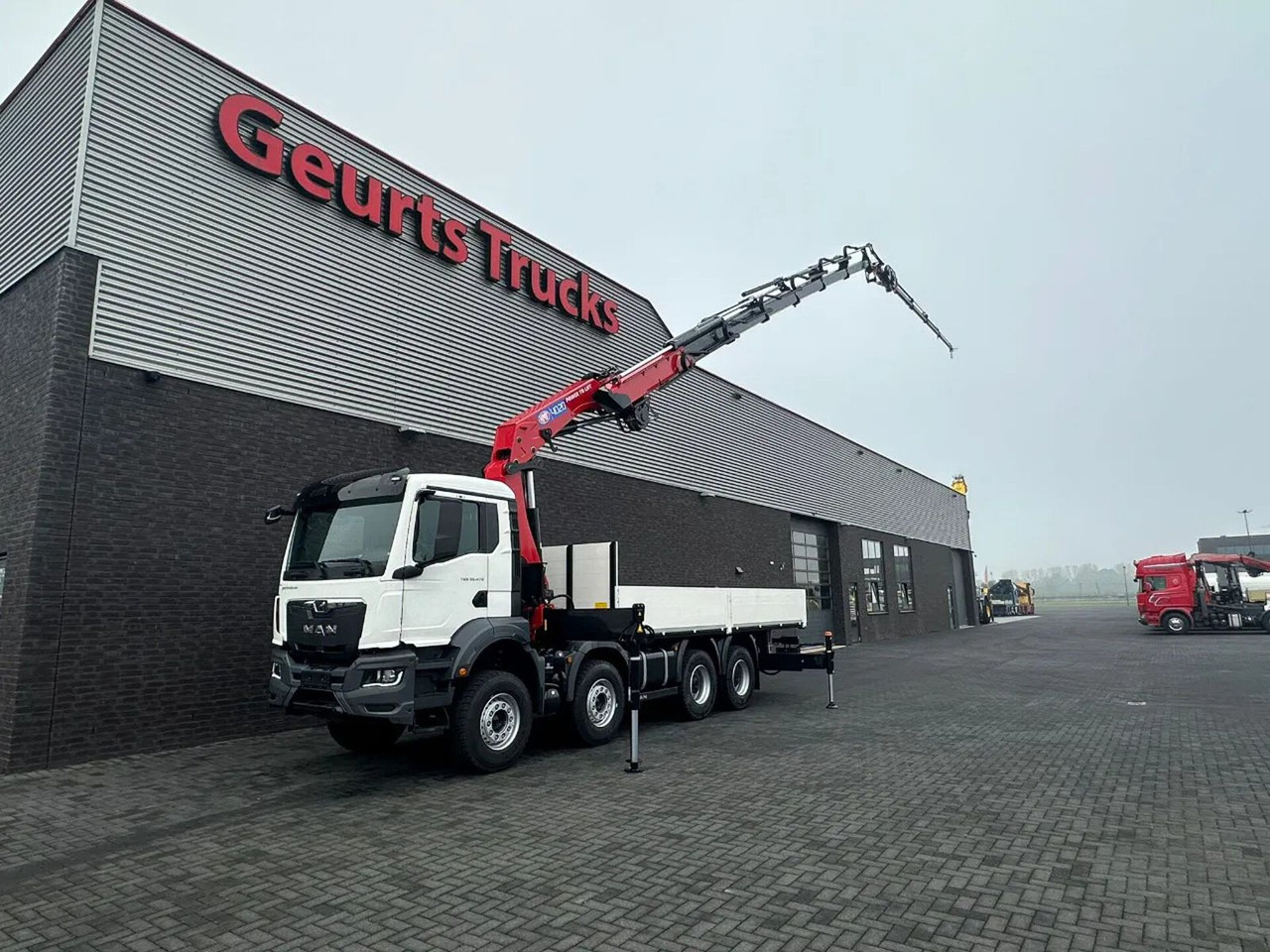 MAN TGS 35.470 8X4 HMF 4020-K6 + FJ 600 K4 KRAAN - Camion con gru: foto 2 MAN TGS 35.470 8X4 HMF 4020-K6 + FJ 600 K4 KRAAN - Camion con gru: foto 2