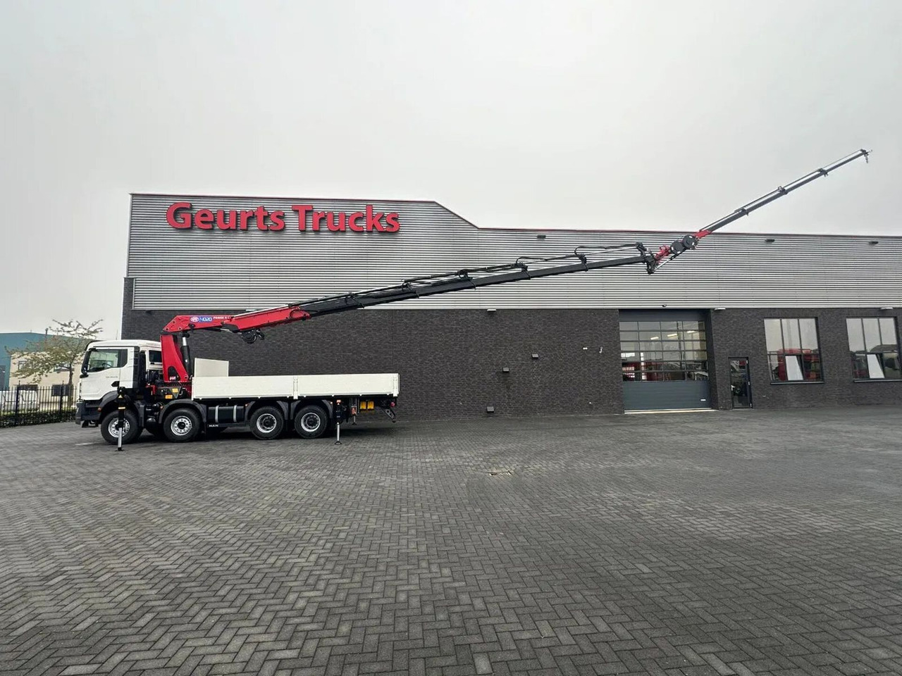 MAN TGS 35.470 8X4 HMF 4020-K6 + FJ 600 K4 KRAAN - Camion con gru: foto 4 MAN TGS 35.470 8X4 HMF 4020-K6 + FJ 600 K4 KRAAN - Camion con gru: foto 4