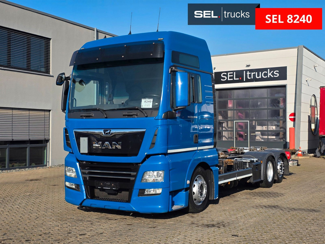 MAN TGX 24.460 6x2-2 LL-U / Ldbw / Standklima - Autocarro portacontainer/ Caisse interchangeable: foto 1 MAN TGX 24.460 6x2-2 LL-U / Ldbw / Standklima - Autocarro portacontainer/ Caisse interchangeable: foto 1
