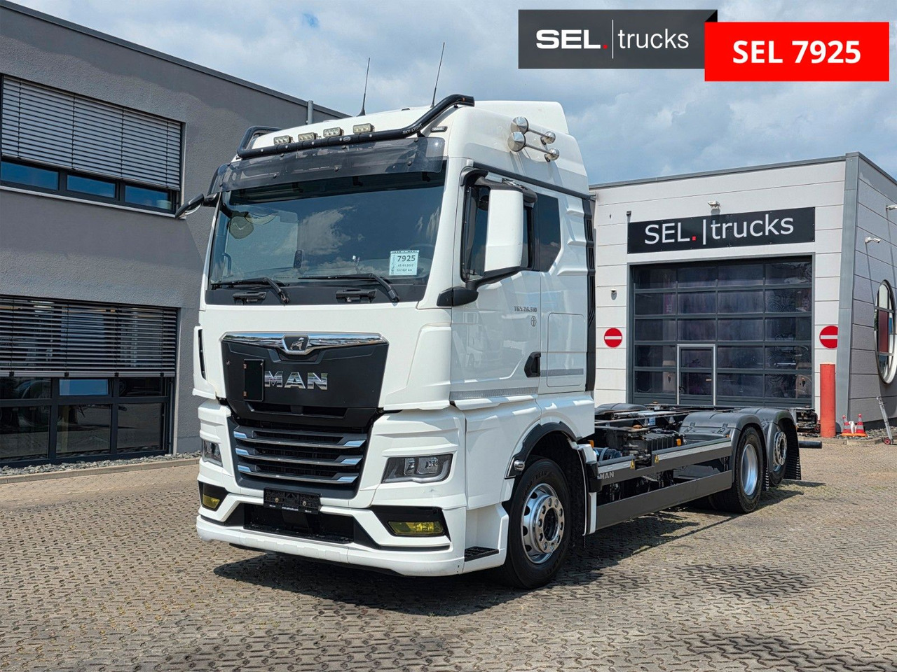 MAN TGX 26.510 6x2-2 LL CH / ZF Intarder / Liftachse - Autocarro portacontainer/ Caisse interchangeable: foto 1 MAN TGX 26.510 6x2-2 LL CH / ZF Intarder / Liftachse - Autocarro portacontainer/ Caisse interchangeable: foto 1