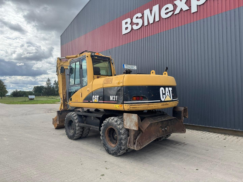 Caterpillar M 315 C - Escavatore gommato: foto 4 Caterpillar M 315 C - Escavatore gommato: foto 4