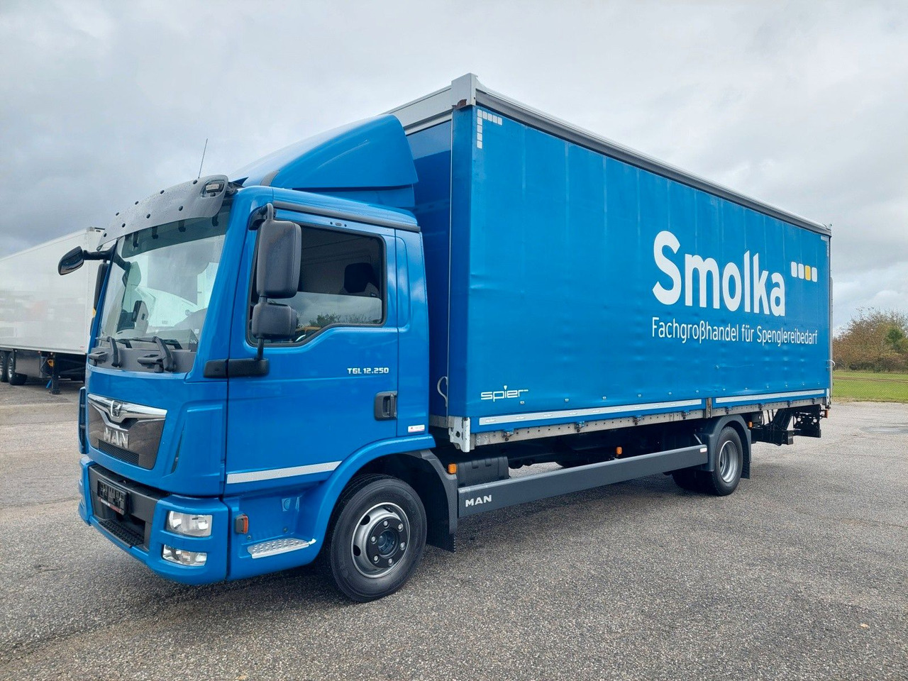 MAN TGL 12.250 BL 4x2 - Camion centinato: foto 1 MAN TGL 12.250 BL 4x2 - Camion centinato: foto 1