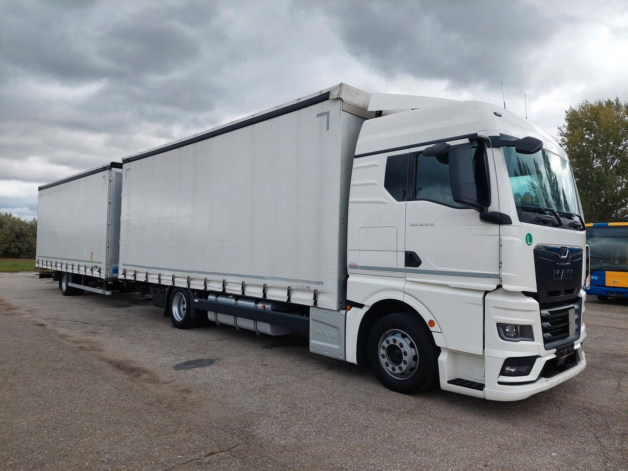 MAN TGX 18.470 LL + Gniotpol G-4080 120 m3 Durchbar - Camion centinato: foto 2 MAN TGX 18.470 LL + Gniotpol G-4080 120 m3 Durchbar - Camion centinato: foto 2