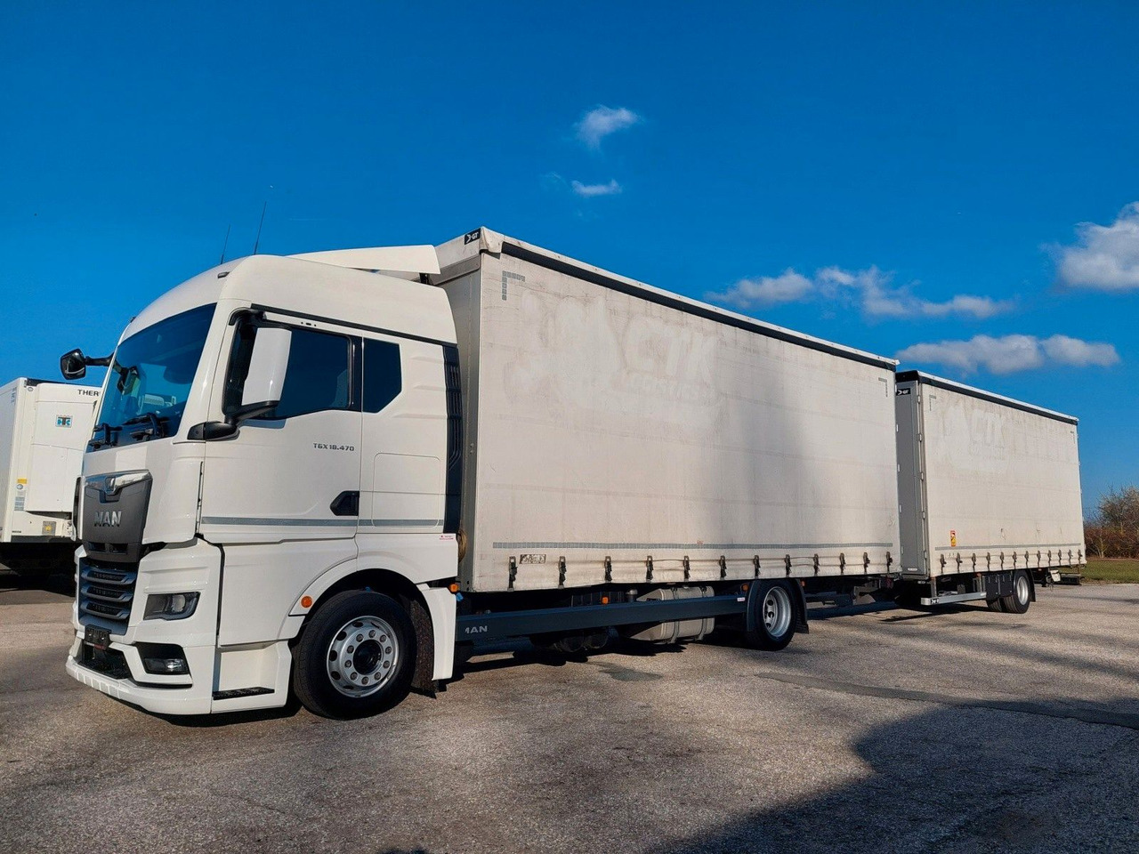 MAN TGX 18.470 LL + Gniotpol G-4080 120 m3 Durchbar - Camion centinato: foto 1 MAN TGX 18.470 LL + Gniotpol G-4080 120 m3 Durchbar - Camion centinato: foto 1