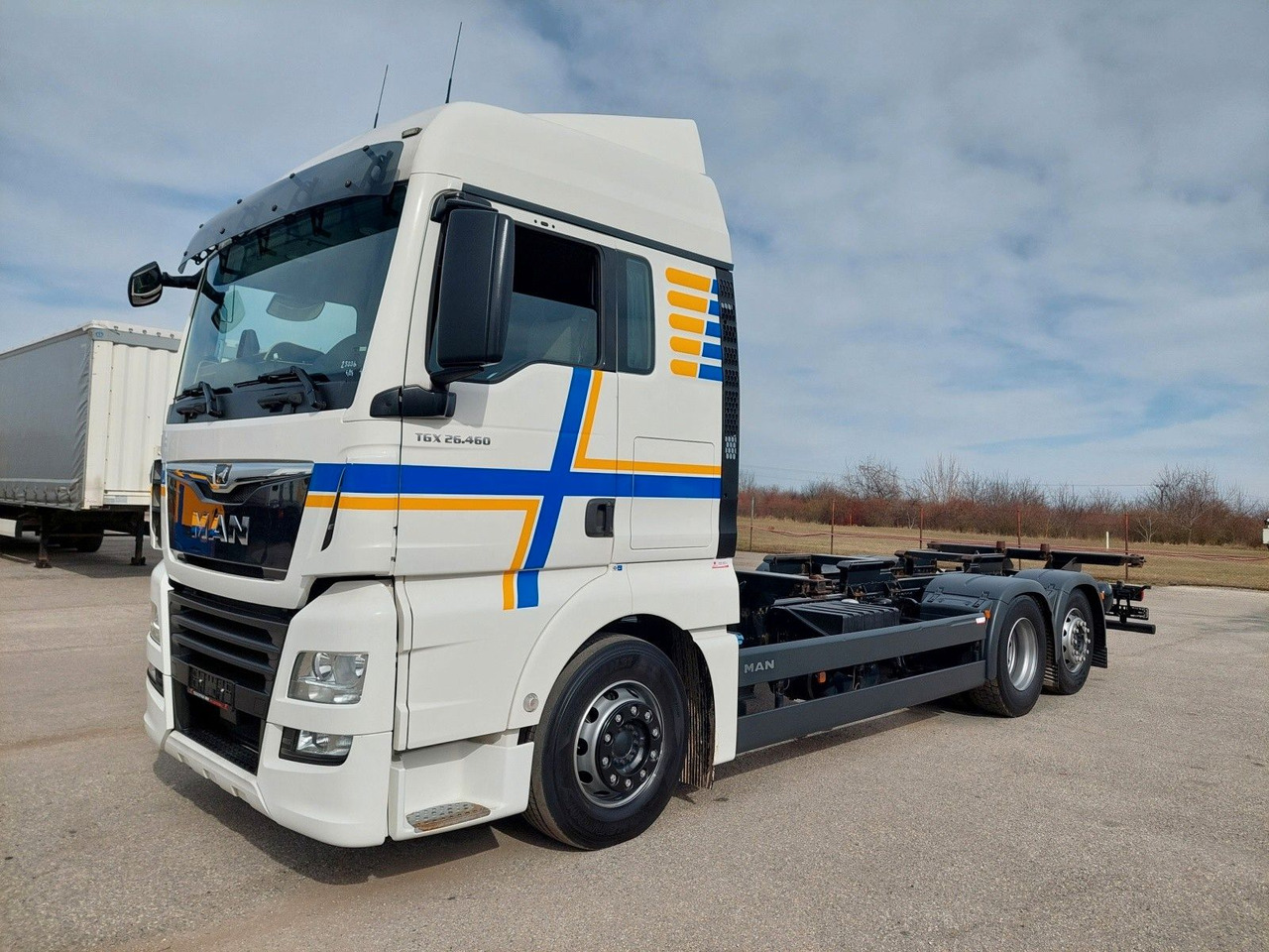 MAN TGX 26.460 LL 6x2/2 - Autocarro portacontainer/ Caisse interchangeable: foto 1 MAN TGX 26.460 LL 6x2/2 - Autocarro portacontainer/ Caisse interchangeable: foto 1