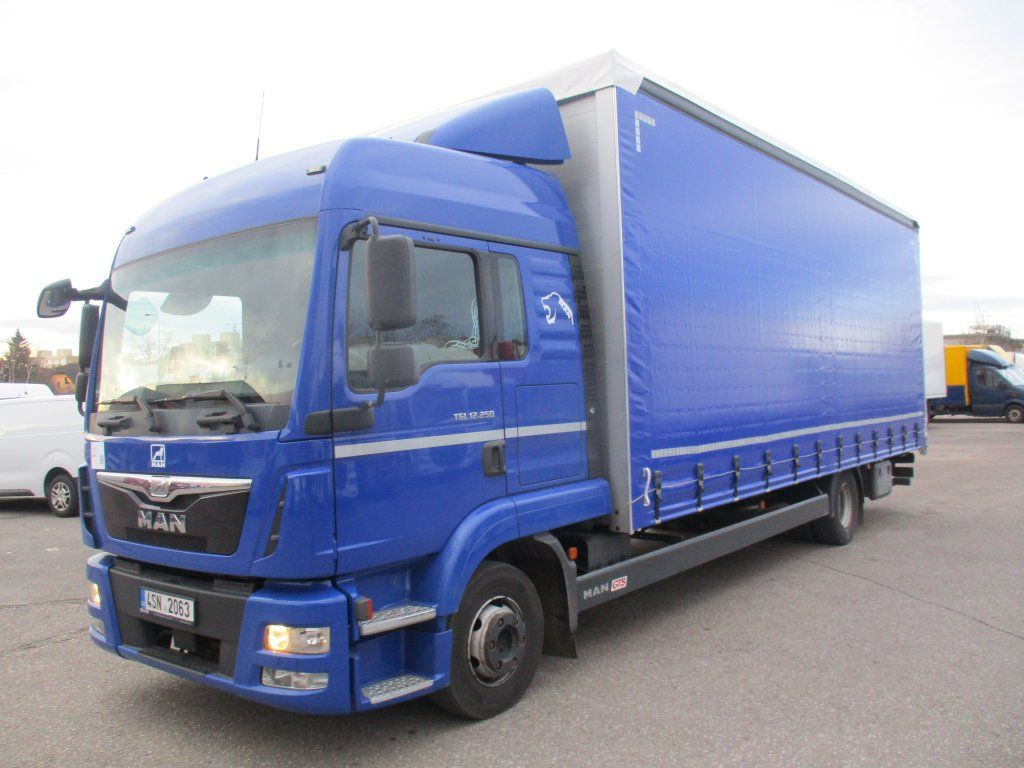 MAN TGL12.250 - Camion centinato: foto 1 MAN TGL12.250 - Camion centinato: foto 1