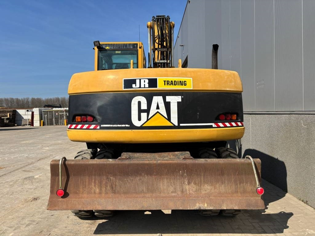 CAT M 313 C (Low verified hours) - Escavatore gommato: foto 4 CAT M 313 C (Low verified hours) - Escavatore gommato: foto 4