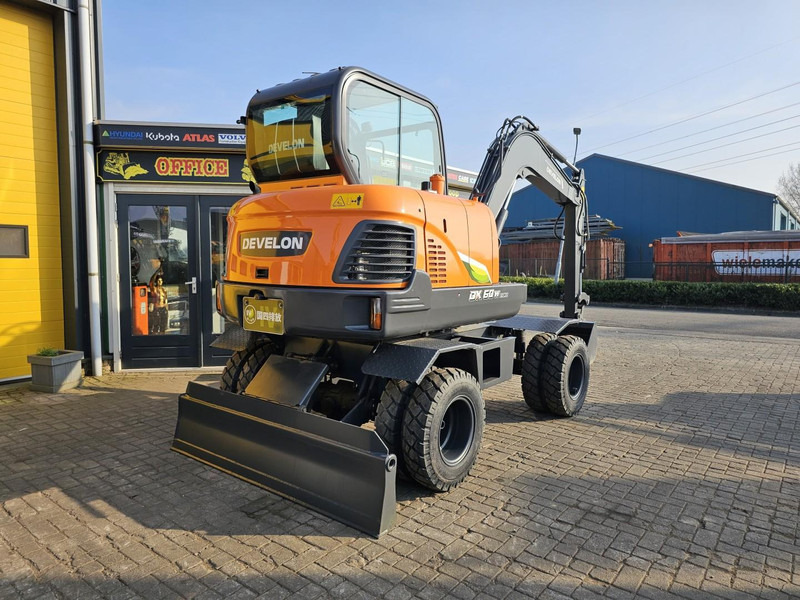 Develon DX60WN ECO-1 - Escavatore gommato: foto 4 Develon DX60WN ECO-1 - Escavatore gommato: foto 4
