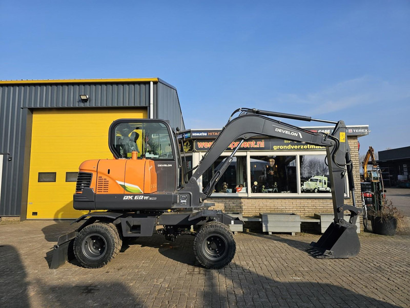 Develon DX60WN ECO-1 - Escavatore gommato: foto 5 Develon DX60WN ECO-1 - Escavatore gommato: foto 5