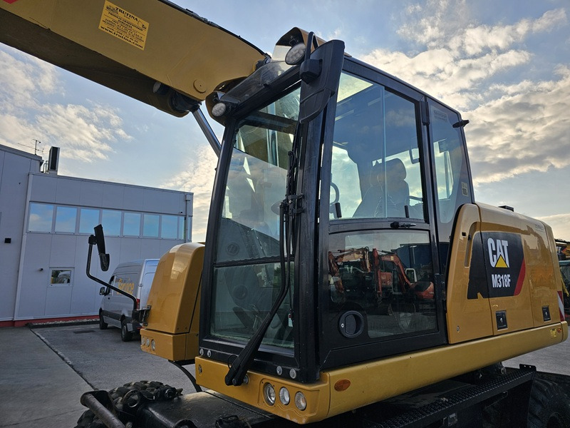 Escavatore gommato CATERPILLAR M318F: foto 8