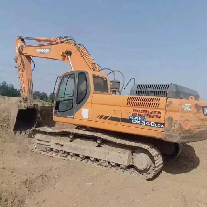 Used Original Korea Doosan 34 Ton Excavator with Cheap Price and Good Condition DOOSAN Dx340LCA Dx225 Dx330 DX360for Sale - Escavatore cingolato: foto 1 Used Original Korea Doosan 34 Ton Excavator with Cheap Price and Good Condition DOOSAN Dx340LCA Dx225 Dx330 DX360for Sale - Escavatore cingolato: foto 1
