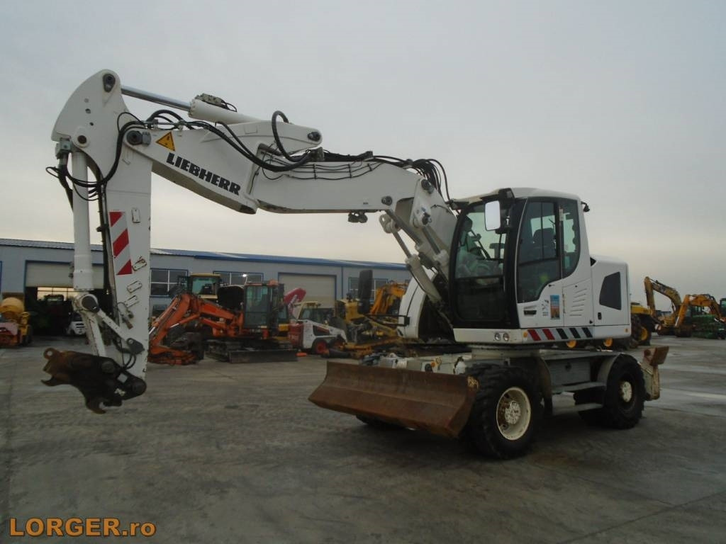 Liebherr A 918 Compact - Escavatore gommato: foto 1 Liebherr A 918 Compact - Escavatore gommato: foto 1