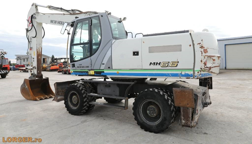 New Holland MH 6.6 + Sandvic Hammer - Escavatore gommato: foto 3 New Holland MH 6.6 + Sandvic Hammer - Escavatore gommato: foto 3