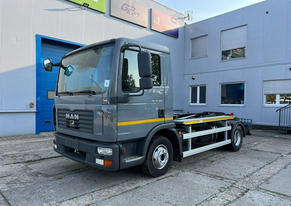 MAN TGL 12.180, hakowiec Janco/GP Lift - Camion immondizia: foto 1 MAN TGL 12.180, hakowiec Janco/GP Lift - Camion immondizia: foto 1
