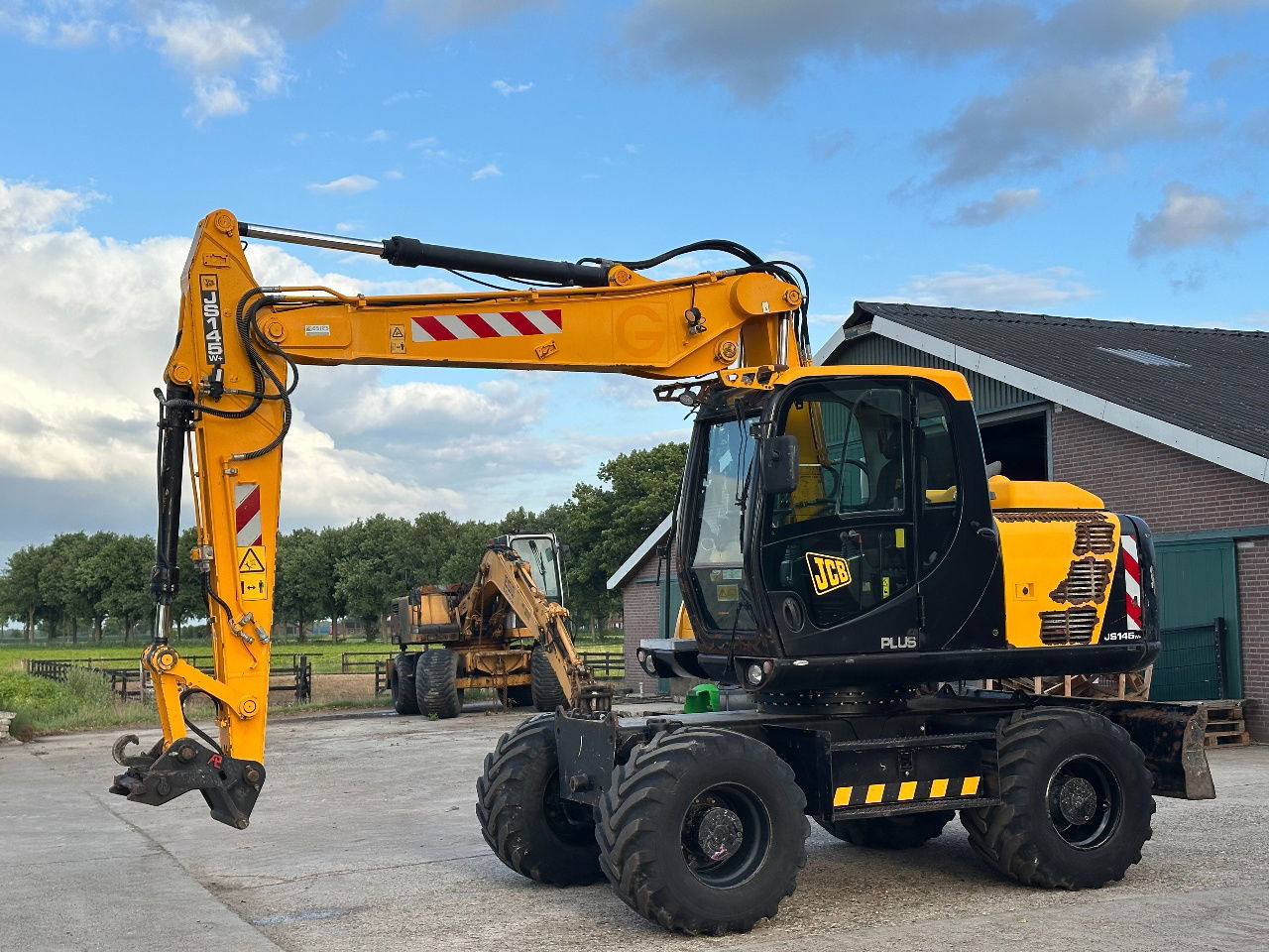 JCB JS145W - Escavatore gommato: foto 1 JCB JS145W - Escavatore gommato: foto 1