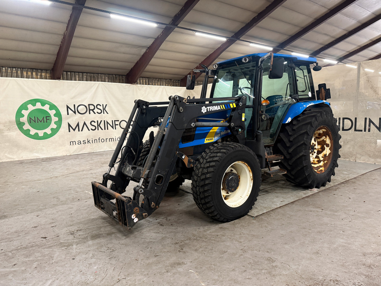 New Holland T5060 - Trattore: foto 1 New Holland T5060 - Trattore: foto 1