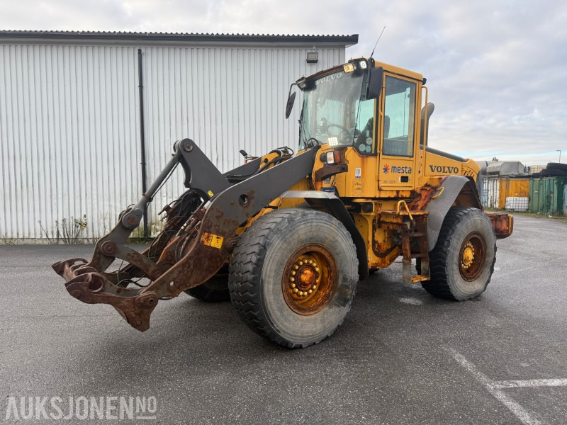 2006 Volvo L70E Hjullaster 3. og 4. funksjon. - Pala gommata: foto 1 2006 Volvo L70E Hjullaster 3. og 4. funksjon. - Pala gommata: foto 1