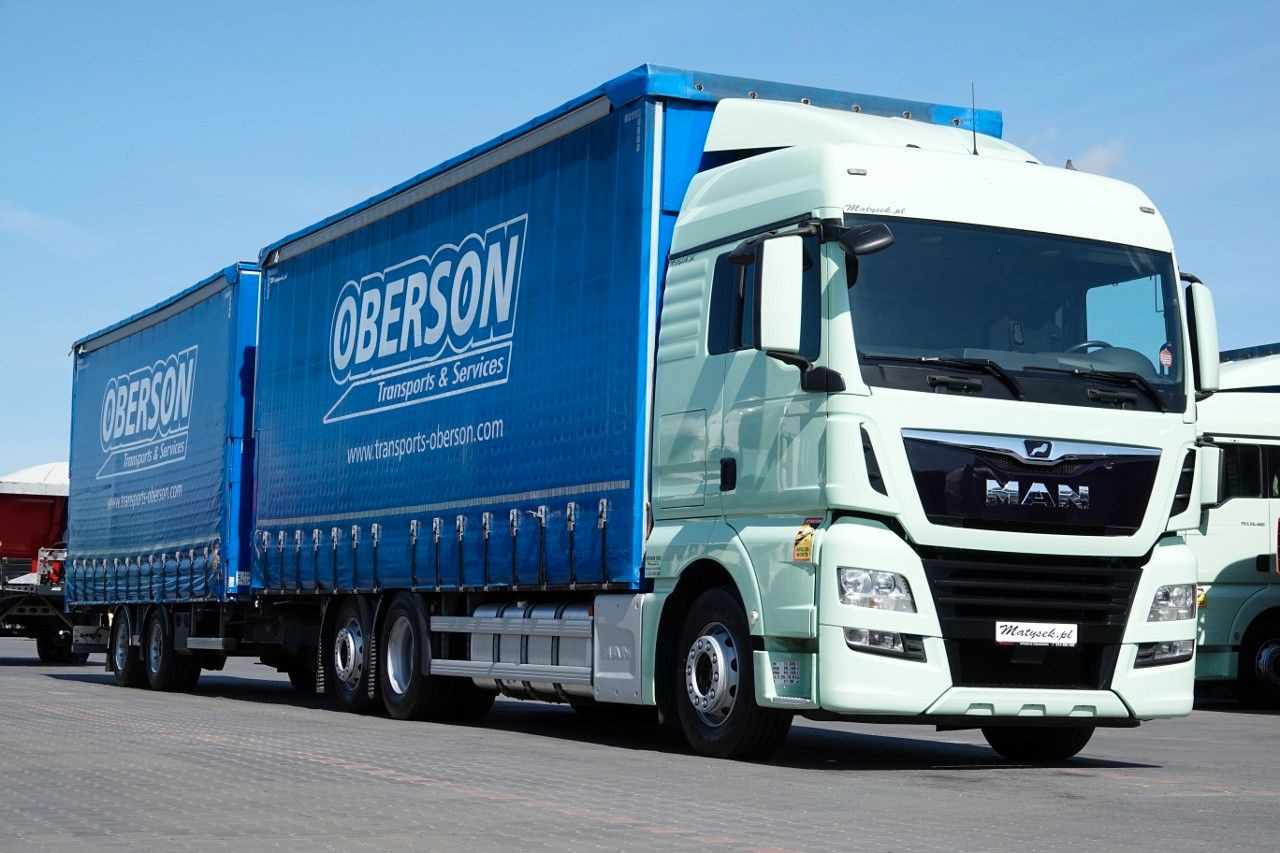 MAN TGX 26.460 / ZESTAW TANDEM PRZEJAZDOWY / 120 M3 - Camion centinato: foto 1 MAN TGX 26.460 / ZESTAW TANDEM PRZEJAZDOWY / 120 M3 - Camion centinato: foto 1