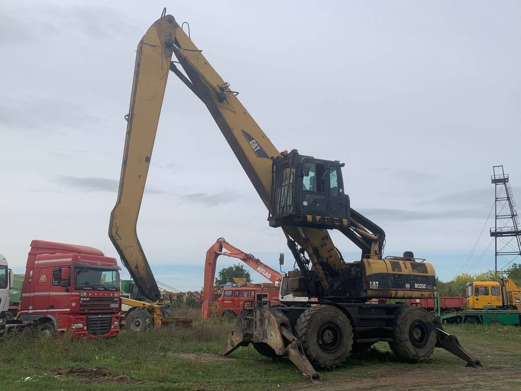 CAT M 325 C L MH - Escavatore per movimentazione: foto 1 CAT M 325 C L MH - Escavatore per movimentazione: foto 1