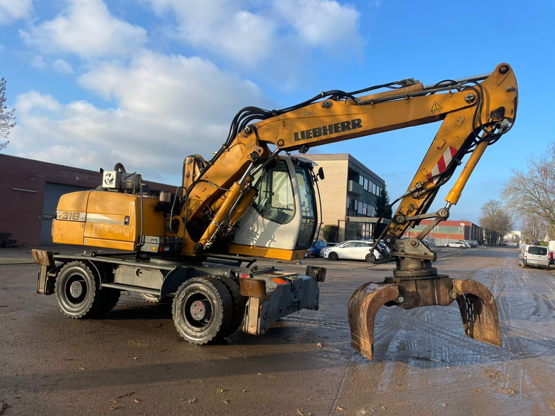 Liebherr A 316 - Escavatore per movimentazione: foto 1 Liebherr A 316 - Escavatore per movimentazione: foto 1