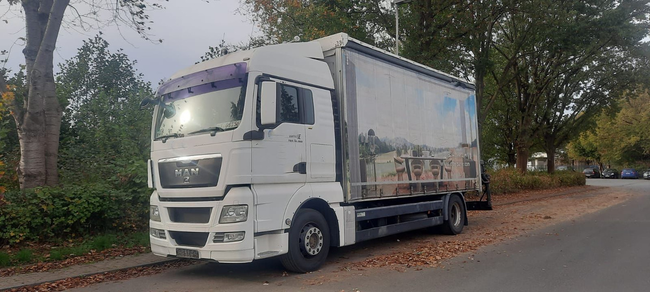 MAN TGX 18.360PS 4x2 G.Haus Kran+Funk - Autocarro con pianale/ Cassone fisso, Camion con gru: foto 1 MAN TGX 18.360PS 4x2 G.Haus Kran+Funk - Autocarro con pianale/ Cassone fisso, Camion con gru: foto 1