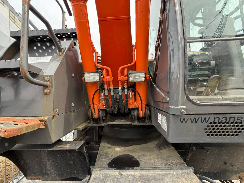 Escavatore gommato Hitachi ZX 140 W-3: foto 20