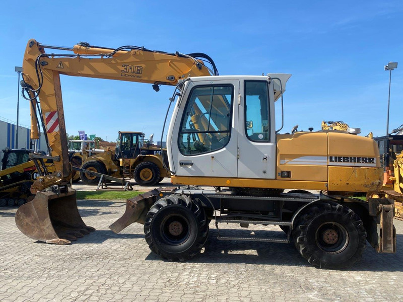 Liebherr A316 Litronic A 316 litronic - Escavatore gommato: foto 2 Liebherr A316 Litronic A 316 litronic - Escavatore gommato: foto 2