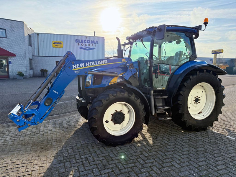 New Holland T6010 Plus + 750TL Voorlader - Trattore: foto 1 New Holland T6010 Plus + 750TL Voorlader - Trattore: foto 1