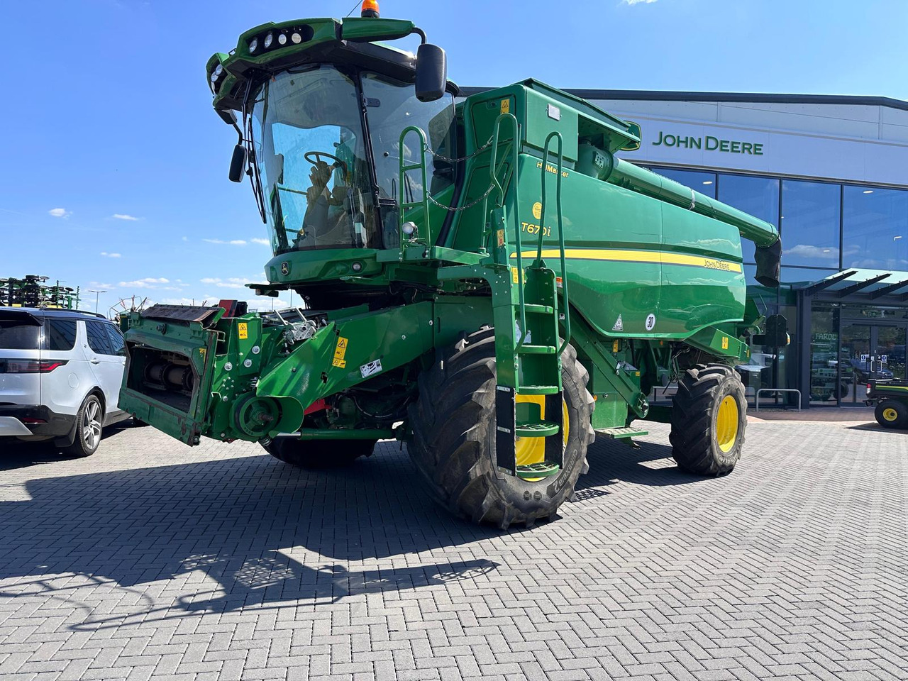 John Deere T670i HM - Mietitrebbia: foto 1 John Deere T670i HM - Mietitrebbia: foto 1