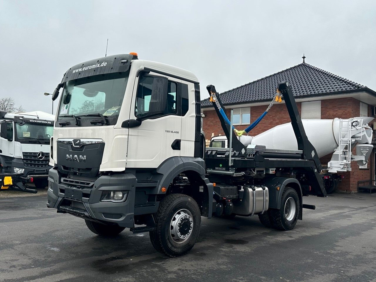 MAN TGS 18.400 4x4 Euro 6e Hyva Absetzkipper - Autocarro ribaltabile, Camion con gru: foto 1 MAN TGS 18.400 4x4 Euro 6e Hyva Absetzkipper - Autocarro ribaltabile, Camion con gru: foto 1