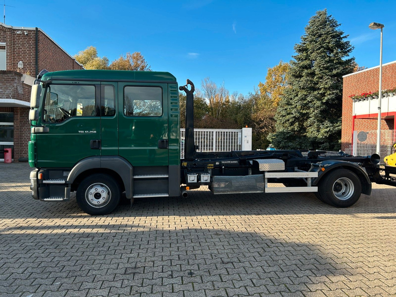 Autocarro scarrabile MAN 12.250 Doppelkabine Abroller: foto 8 Autocarro scarrabile MAN 12.250 Doppelkabine Abroller: foto 8