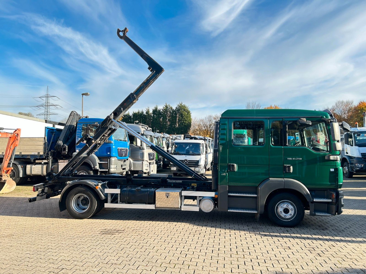 Autocarro scarrabile MAN 12.250 Doppelkabine Abroller: foto 15 Autocarro scarrabile MAN 12.250 Doppelkabine Abroller: foto 15