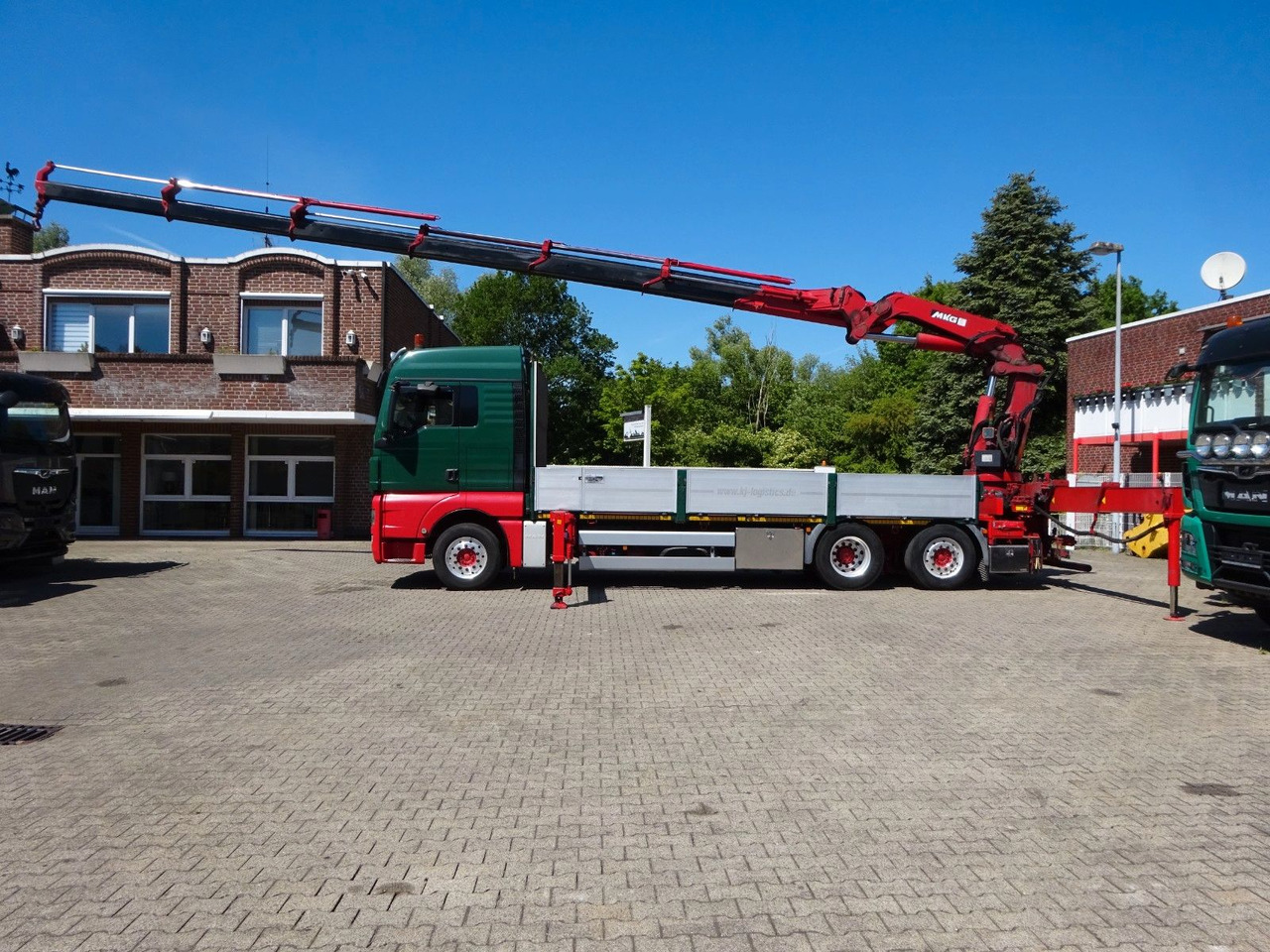 MAN 26.480 TGX + MKG HLK531 Kran +Lift-Lenkachse - Camion con gru: foto 2 MAN 26.480 TGX + MKG HLK531 Kran +Lift-Lenkachse - Camion con gru: foto 2