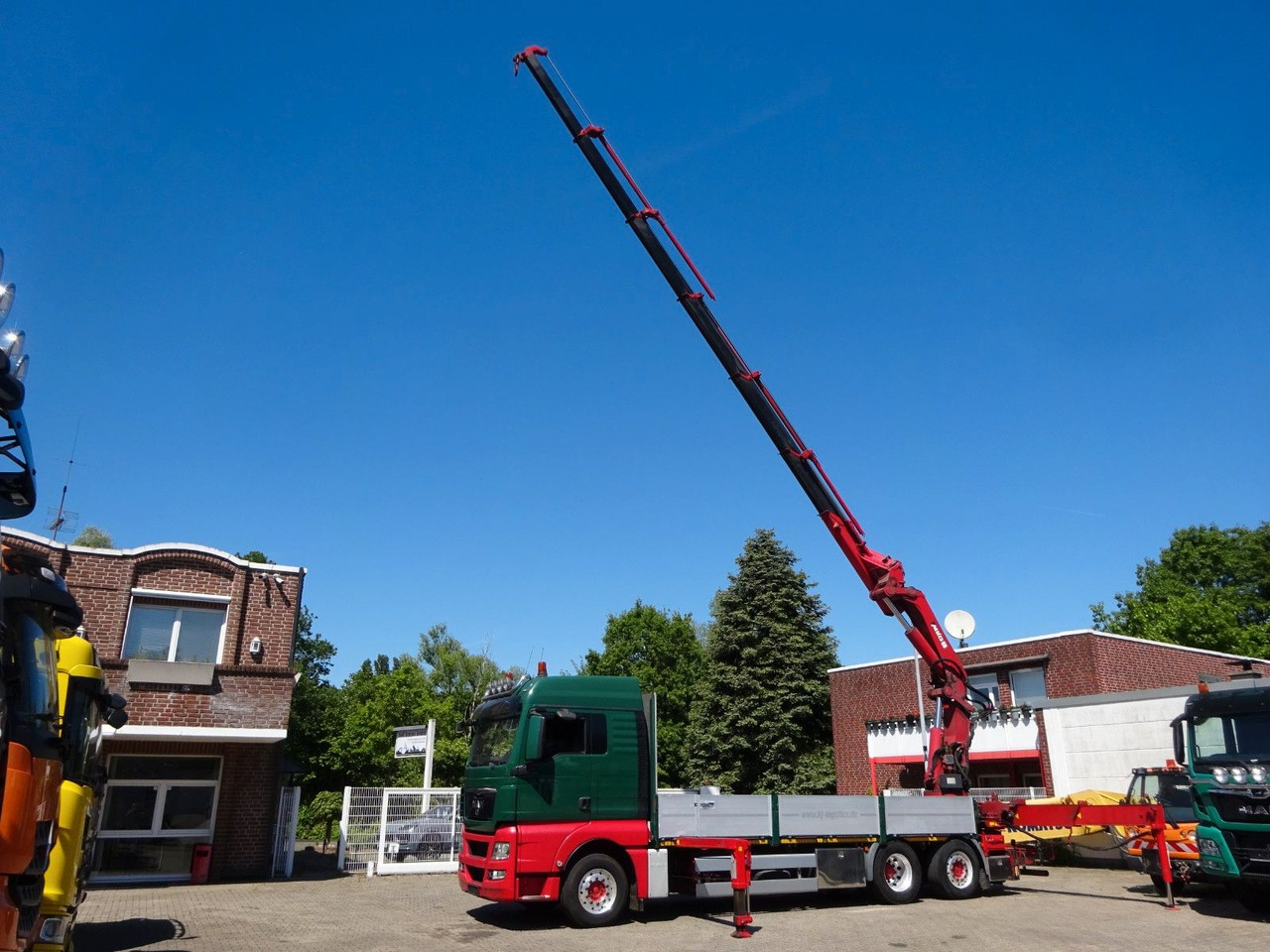 MAN 26.480 TGX + MKG HLK531 Kran +Lift-Lenkachse - Autocarro con pianale/ Cassone fisso, Camion con gru: foto 3 MAN 26.480 TGX + MKG HLK531 Kran +Lift-Lenkachse - Autocarro con pianale/ Cassone fisso, Camion con gru: foto 3