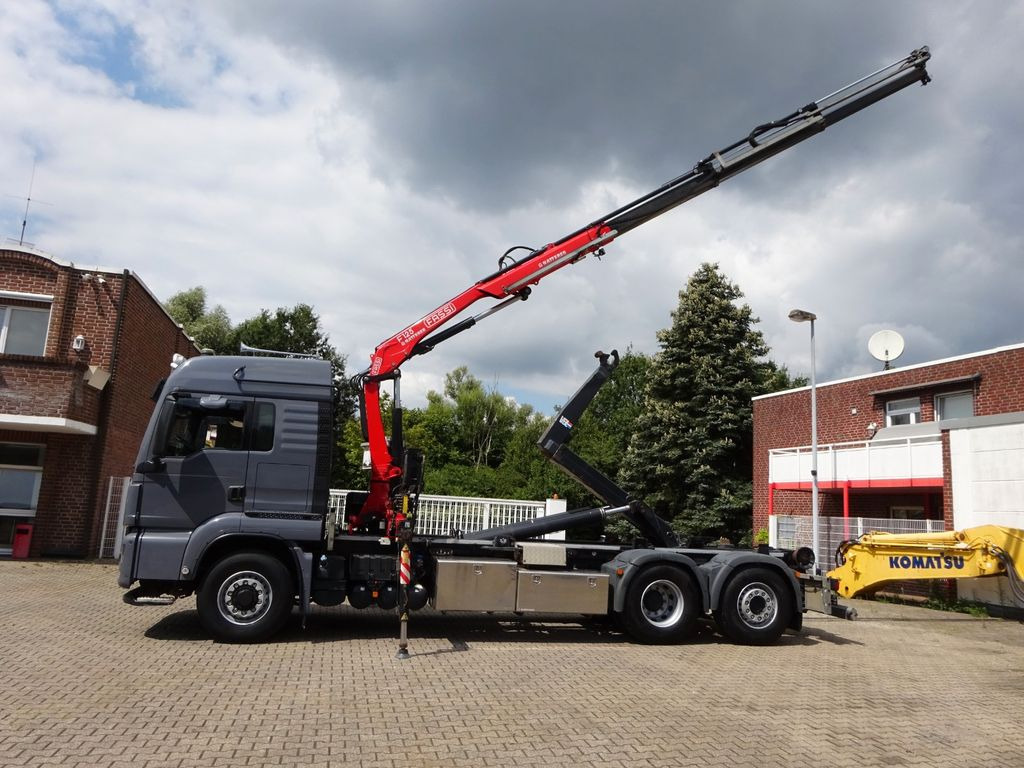 MAN 26.500 Abroller + Fassi F125A Kran 6x2-4 Allrad MAN 26.500 Abroller + Fassi F125A Kran 6x2-4 Allrad - Autocarro scarrabile, Camion con gru: foto 1 MAN 26.500 Abroller + Fassi F125A Kran 6x2-4 Allrad MAN 26.500 Abroller + Fassi F125A Kran 6x2-4 Allrad - Autocarro scarrabile, Camion con gru: foto 1