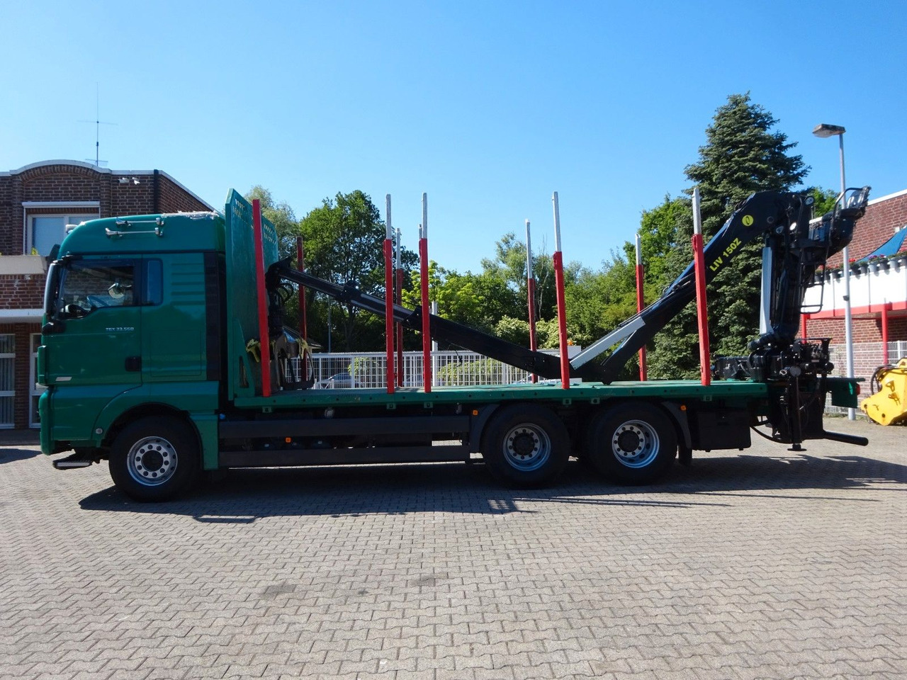MAN 33.560 TGX mit TAJFUN L150Z Holzladekran 6x4 - Camion trasporto legname, Camion con gru: foto 3 MAN 33.560 TGX mit TAJFUN L150Z Holzladekran 6x4 - Camion trasporto legname, Camion con gru: foto 3