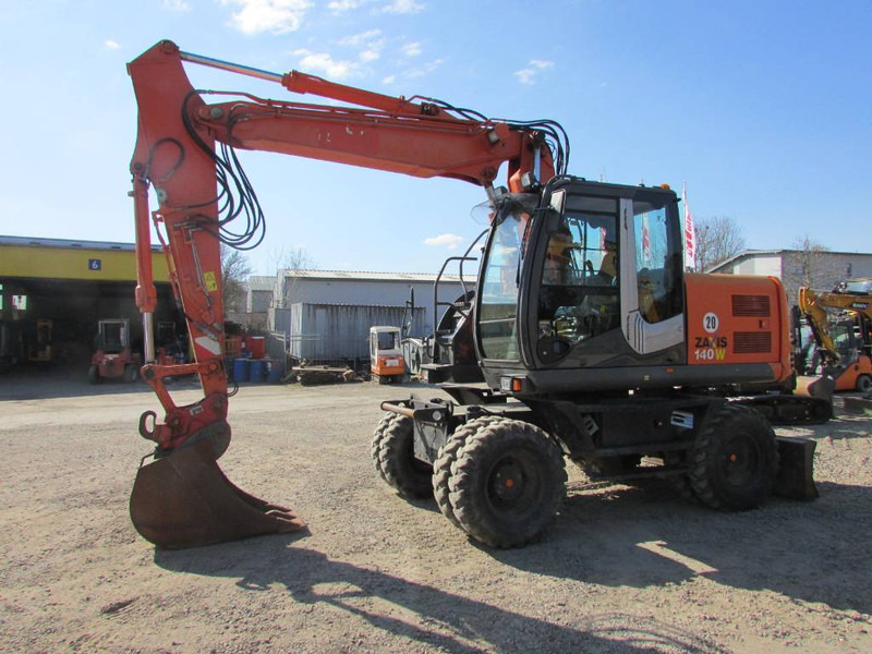 Hitachi ZX 140 W-3 Mobilbagger 48.000 EUR / Klima - Escavatore gommato: foto 1 Hitachi ZX 140 W-3 Mobilbagger 48.000 EUR / Klima - Escavatore gommato: foto 1