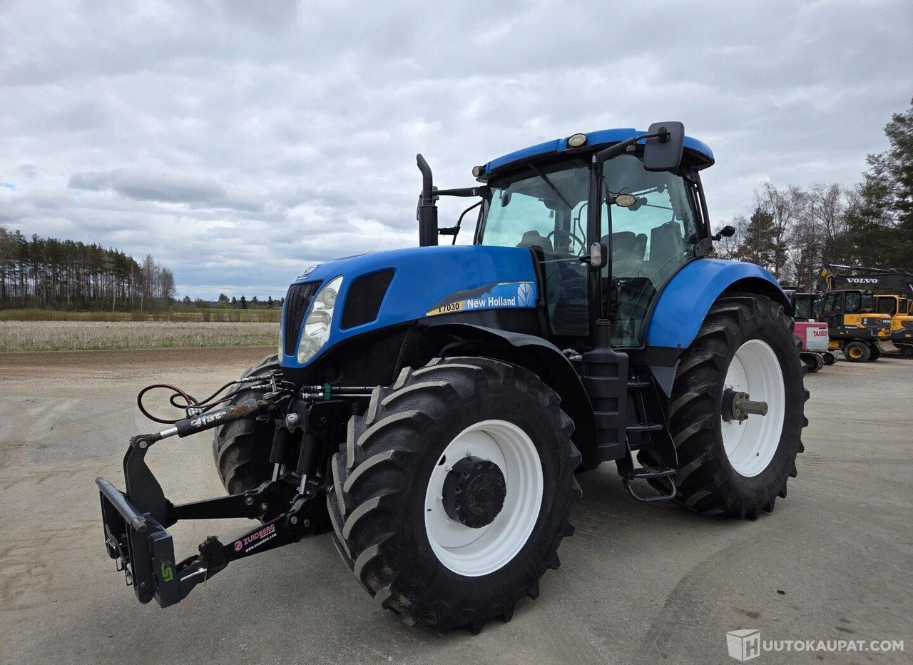New Holland T7030 PC, 2007, 6.8 l, Diesel, 10 350 h Traktori, Honkajoki - Macchina agricola: foto 1 New Holland T7030 PC, 2007, 6.8 l, Diesel, 10 350 h Traktori, Honkajoki - Macchina agricola: foto 1