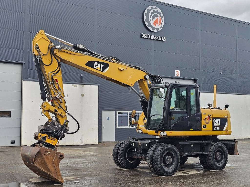 CAT M 316 D - Escavatore gommato: foto 1 CAT M 316 D - Escavatore gommato: foto 1