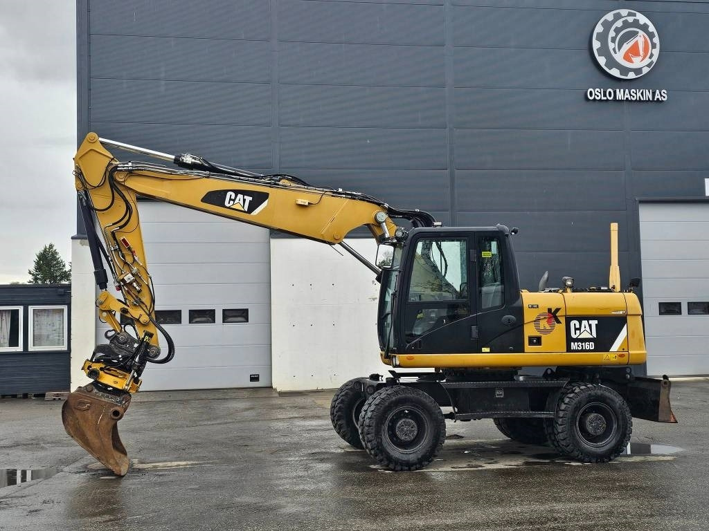 CAT M 316 D - Escavatore gommato: foto 2 CAT M 316 D - Escavatore gommato: foto 2