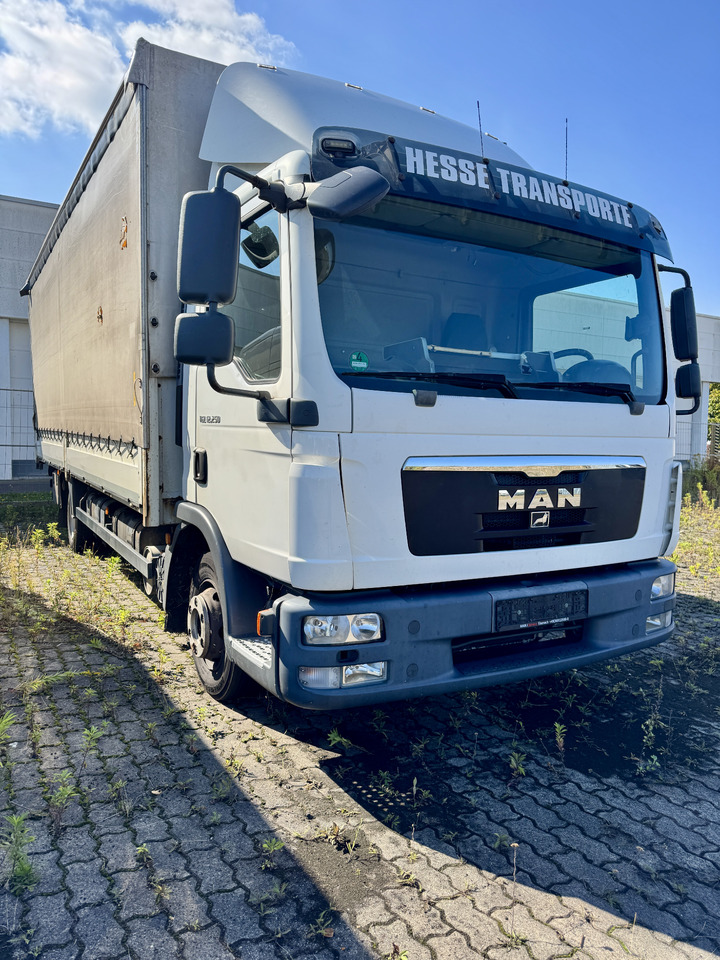 MAN 12.250 - Camion centinato: foto 1 MAN 12.250 - Camion centinato: foto 1