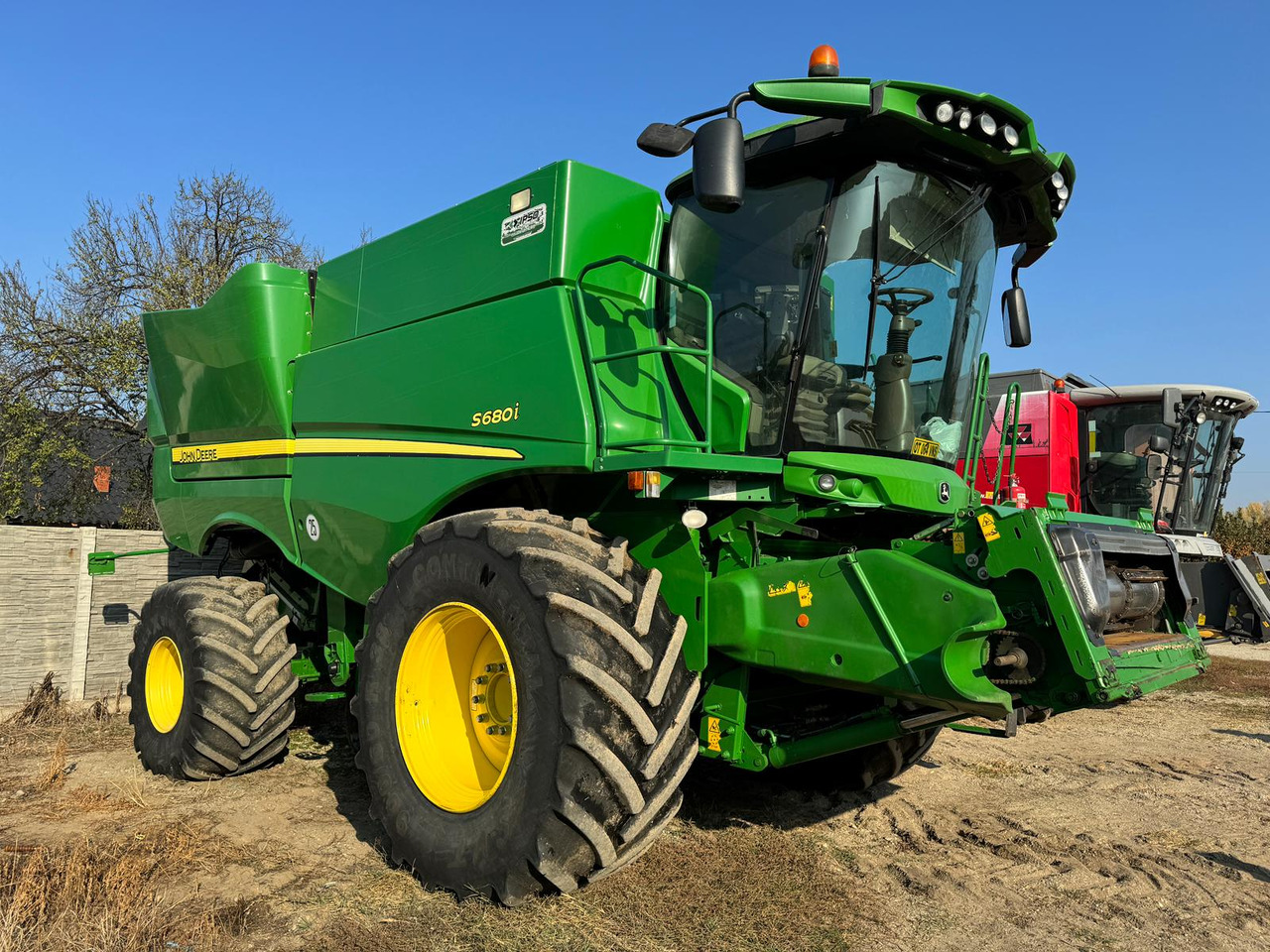 John Deere S680i combine + 635X Header + Zurn trailer - Mietitrebbia: foto 1 John Deere S680i combine + 635X Header + Zurn trailer - Mietitrebbia: foto 1