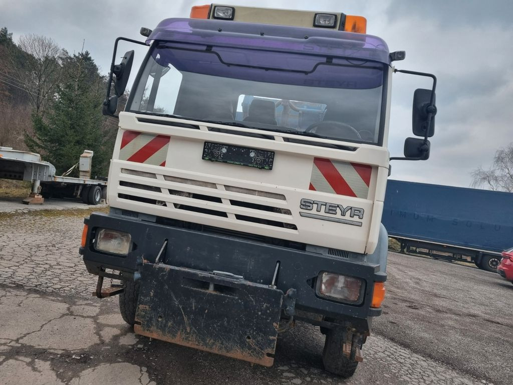 MAN (STEYR) 18.284 4x4 abrollkipper - Autocarro scarrabile: foto 2 MAN (STEYR) 18.284 4x4 abrollkipper - Autocarro scarrabile: foto 2